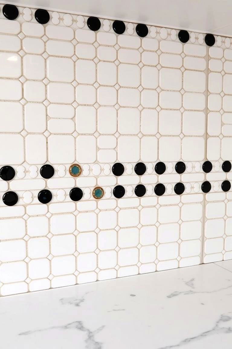 Elegant Mosaic Detailing - 24 Black and White Kitchen Backsplash Ideas