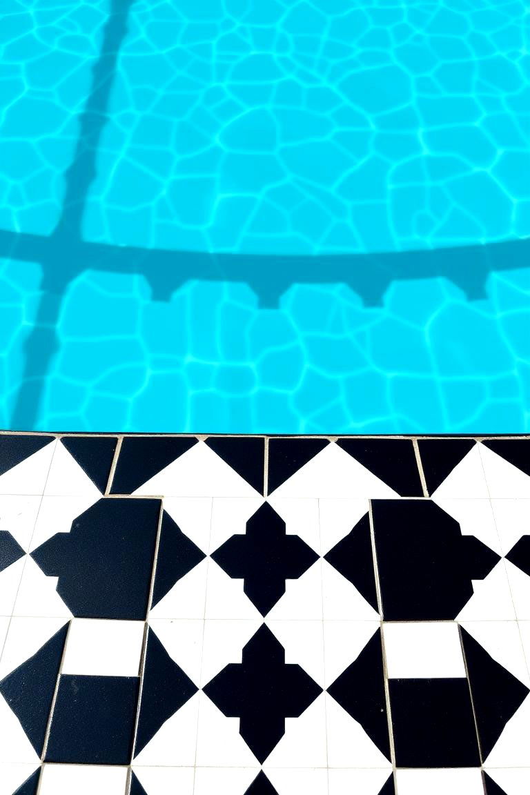 Geometric Patterned Tiles - 24 Waterline Pool Tile Ideas