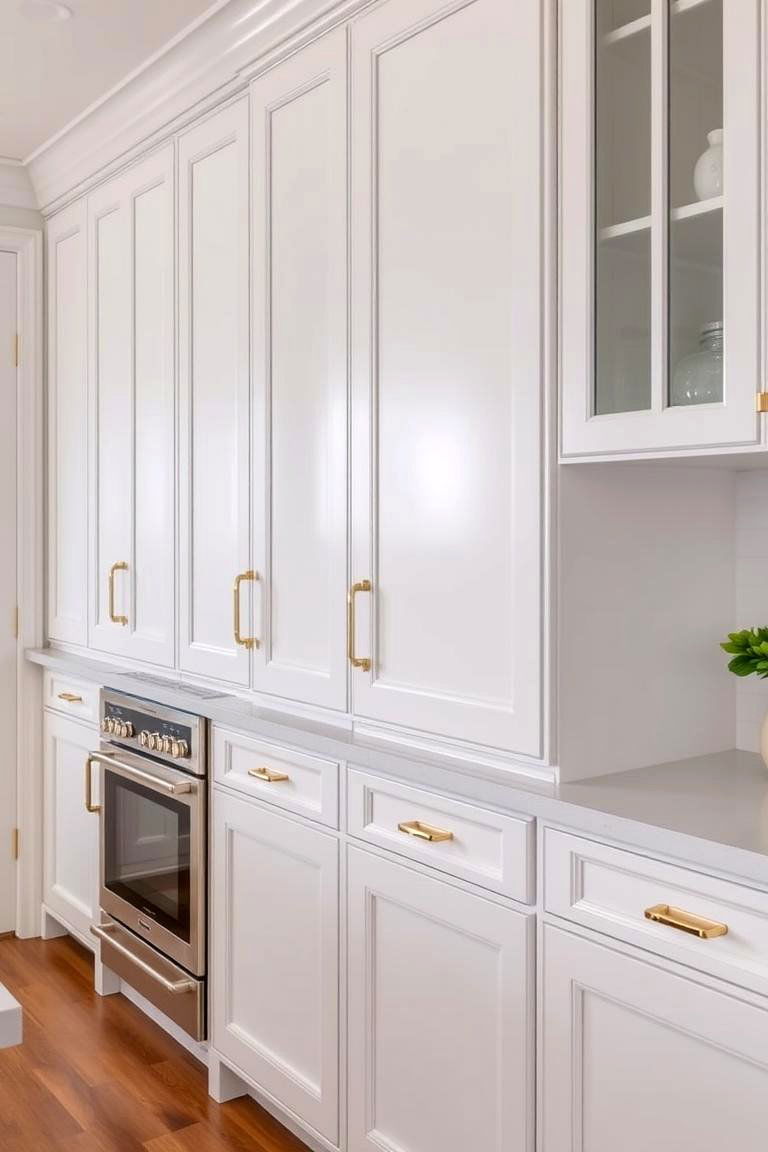 Gold Hardware on Crisp White Cabinets - 24 black white and gold kitchen ideas