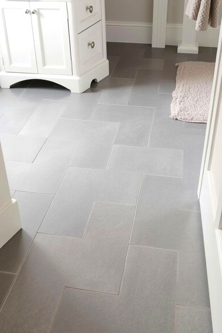 Grey Floor Tiles in a Herringbone Pattern - 24 Grey Bathroom Ideas
