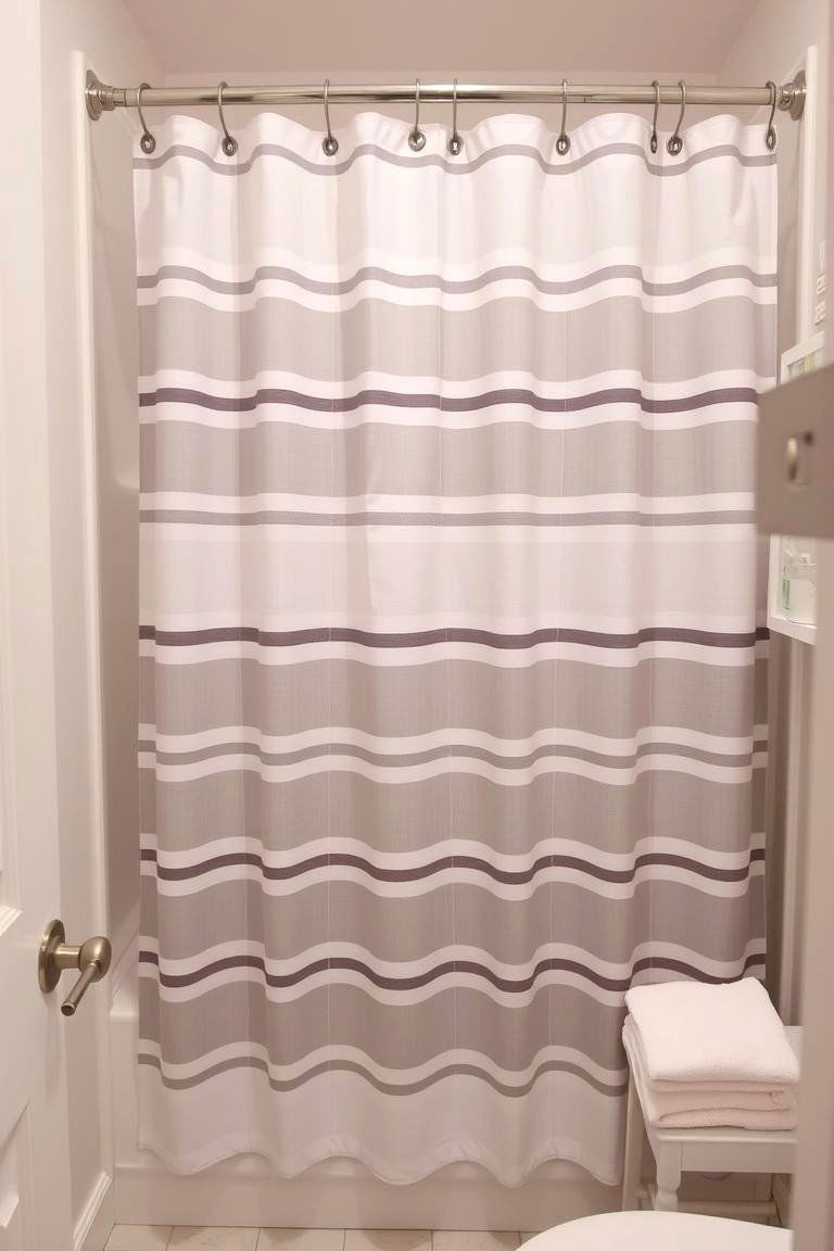 Grey and White Striped Shower Curtain and Matching Towels - 24 Grey and White Bathroom Ideas