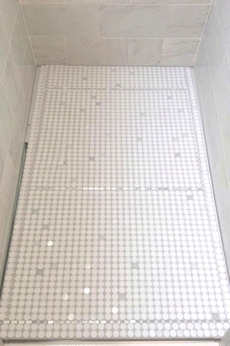 Metallic Accent Tiles - 24 Shower Floor Tile Ideas
