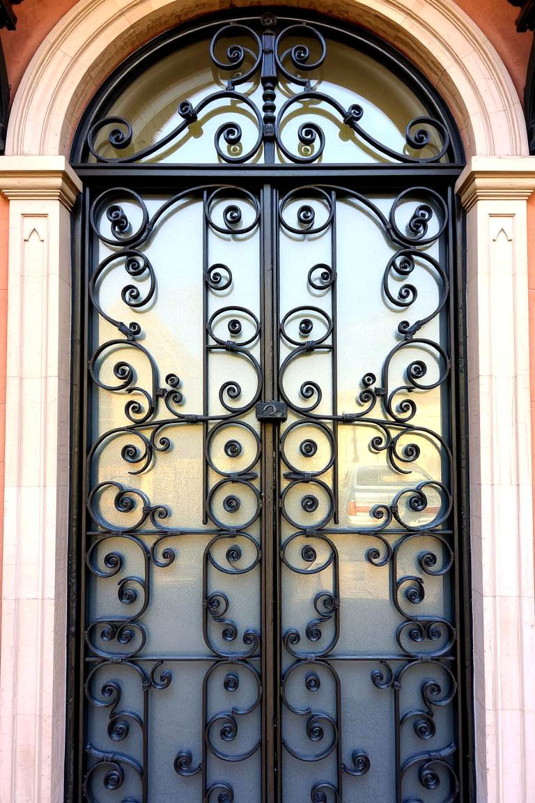 Ornate Iron Detailing - 24 Mediterranean Front Door Ideas