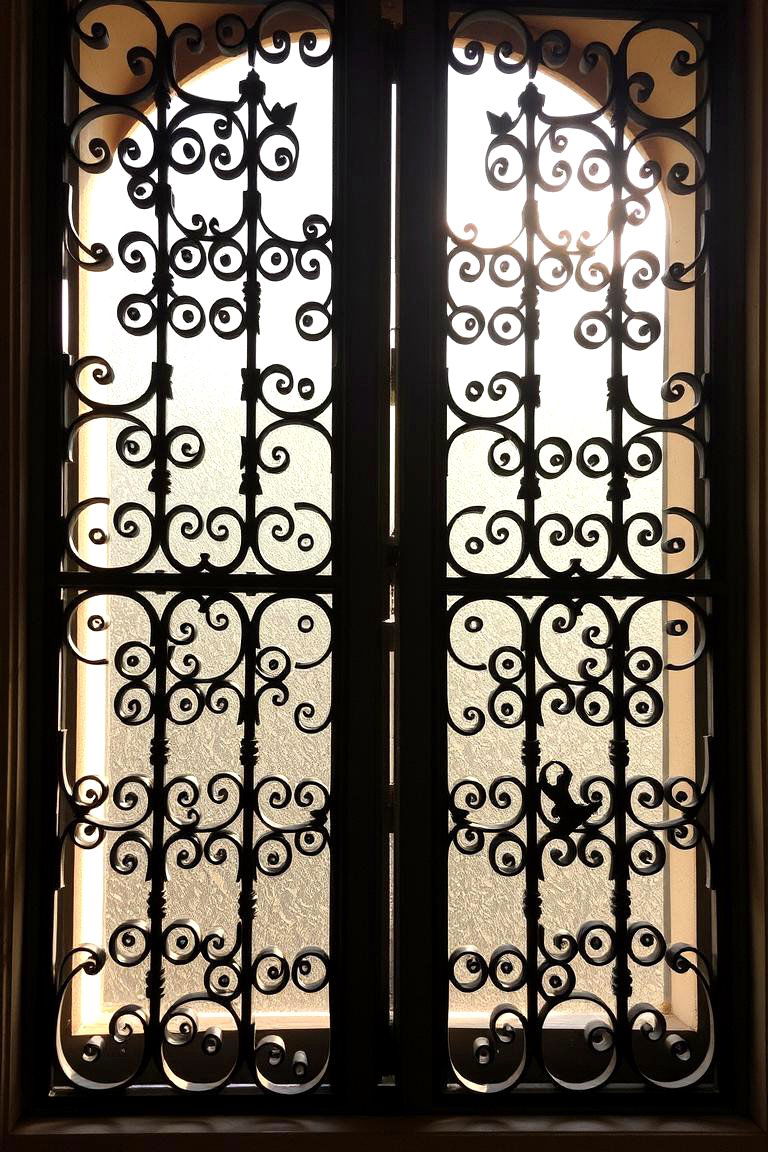 Ornate Iron Grilles - 24 spanish style windows