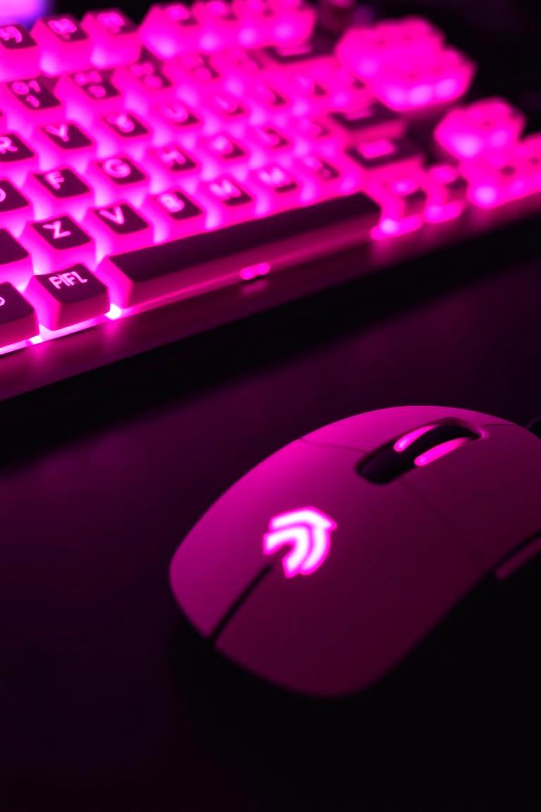 Pink Backlit Keyboard and Mouse Combo - 24 Pink Gaming Setup Ideas
