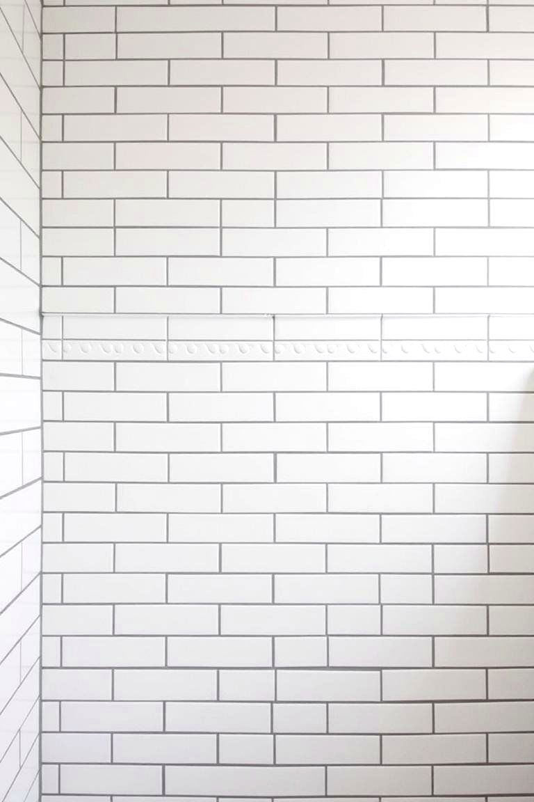 Subway Tile Walls - 24 Industrial Bathroom Ideas