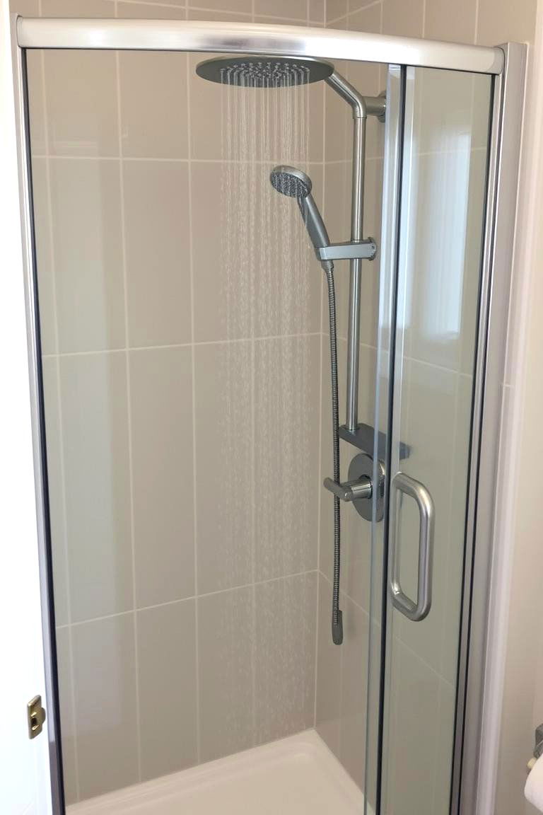 Versatility with a Handheld Shower Sprayer - 24 Small Bathroom Walk-in Shower Ideas