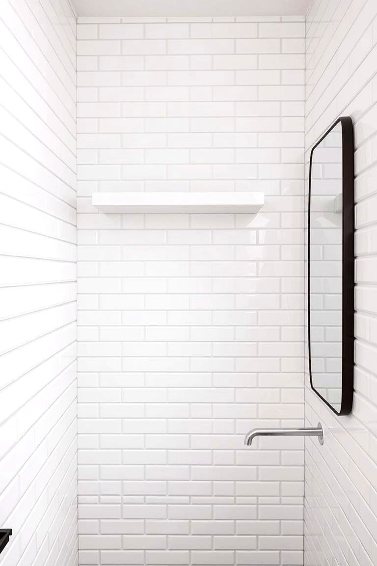 White Stacked Tiles for a Contemporary Feel - 24 White Tile Bathroom Ideas