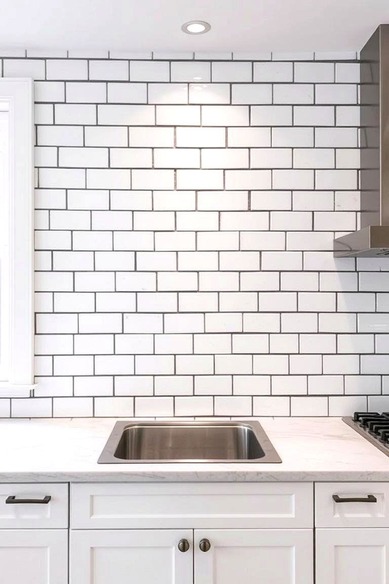 White Subway Tiles with Dark Grout for a Bold Contrast - 24 Kitchen Backsplash Ideas